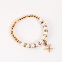 Add a touch of cute to your outfit with the Selah Pearl Bracelet. Featuring a timeless gold stretch bracelet with genuine freshwater pearls and sweet gold seashell or starfish charm, this bracelet brings a bit of fun to any summer outfit. Stretch style bracelet Nickel Free Hypoallergenic Seashell Bracelet Ideas, Beach Inspired Bracelets, Gold Stretch Bracelet, Seashell Bracelet, Beach Icon, Gold Beach, Starfish Bracelet, Beads Bracelet Design, Clay Bead