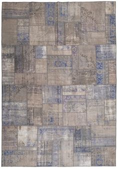 an area rug with many different colors and patterns on it, including blue, gray, black