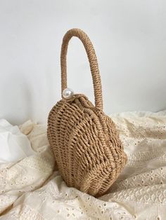 Chic and stylish, the Elena Handbags Summer Straw Shell Shape Shoulder Purse is a luxurious addition to your accessories. Crafted from straw and beautifully shaped like a seashell, this purse is an exquisite blend of form and function. Its elegant design makes it the ideal accessory for a day in the city or an evening on the beach. Size: 23cm wide x 15cm tall (9in x 6in) Designer Style ID: 8473 Woven Handbags, Designer Style, Stylish Bag, Shoulder Purse, Elegant Design, Sea Shells, The City, Straw, Shells