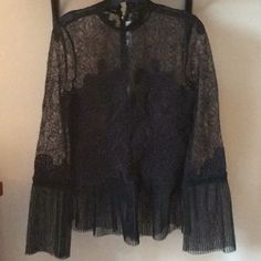 Gorgeous , Designer, Black Lace Blouse. Zipper Closure In The Back. This Blouse Will Make You Fell So Elegant And Very Sexy. One Of The Pieces You Must Have In Your Closet. Pristine Condition. Sheer Blouse Piece For Party, Designer Black Top For Evening, Elegant Sheer Blouse For Party, Black Lace Blouse For Evening, Black Lace Evening Blouse, Designer Black Sheer Top, Designer Black Long Sleeve Blouse, Black Long Sleeve Lace Top For Evening, Designer Sheer Sleeves Blouse For Party