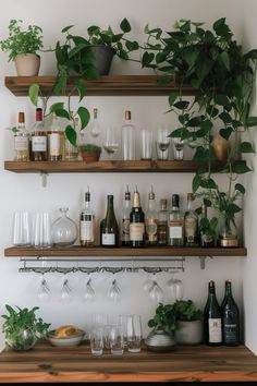 the shelves are filled with bottles, glasses and other things to drink while sitting on top of them