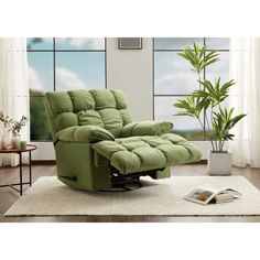 a green recliner sitting on top of a white rug