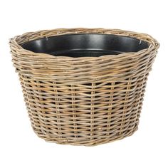 a wicker basket is shown on a white background, with the bottom half empty