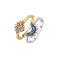 two gold and silver rings with different colored stones on each ring, one has a sun and