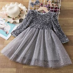 This Long Sleeves Sequin Top Glimmering Princess Party Dress is made of high-quality fabric, very soft and comfortable to wear. It is suitable for girls' birthday parties, Christmas Day, or New Year's Eve. The shining sequins on the top will make your girl look like a princess in this dress. Features: Sequin design. Full sleeve design. Mid-calf length. Comfortable to wear. Elegant and classy. Fabric & Care: Made of high-quality cotton fabric, viscose, and mesh. Hand wash is preferred. Do not ble Princess Costume Kids, Long Sleeve Sequin Top, Girls Winter Dresses, Formal Ball Gown, 파티 드레스, Shiny Dresses, Kids Party Dresses, New Years Dress, Girl Princess Dress