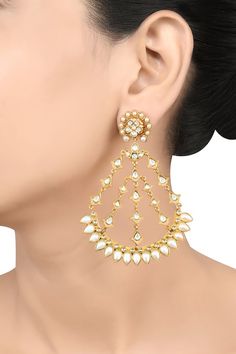 Gold plated silver chandbali, floral cutwork earrings with stone embellishments. - Aza Fashions Designer Wear Chandbali Jewelry With Intricate Design, Elegant Chandbalis With Cutdana For Designer Wear, Elegant Heavy Jhumkas For Designer Wear, Elegant Designer Jhumkas For Festive Occasions, Elegant Designer Festive Jhumkas, Festive Elegant Designer Jhumkas, White Danglers With Intricate Design For Reception, Chandbali Chandelier Earrings With Intricate Design For Reception, Elegant Designer Stone Work Jhumkas