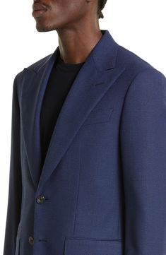 Impeccable Italian tailoring shines on this navy suit crafted from soft wool in a single-breasted silhouette framed with wide peaked lapels. Jacket has peaked lapels; four-button cuffs; chest welt pocket; front flap pockets; side vents Pants have zip fly with button-tab closure; side waist-adjuster tabs; side-seam pockets; back welt pockets Jacket is lined; pants are lined to knee 100% wool Dry clean Made in Italy Designer Clothing Evening Suit With Double Button Closure And Notch Lapel, Wool Double Breasted Suit With Suit Collar, Luxury Tweed Jacket With Suit Collar And Pressed Crease, Luxury Tweed Jacket With Pressed Crease And Suit Collar, Wool Suit With Lapel Collar For Evening, Luxury Notch Lapel Sport Coat For Evening, Luxury Evening Sport Coat With Notch Lapel, Blue Single Breasted Suits For Evening, Wool Tuxedo Blazer With Notch Lapel