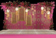 a pink and gold backdrop with flowers on the wall, lights hanging from it's sides