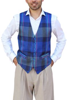 Men's printed linen waistcoat, Blue plaid casual vest, Men's Argentine Tango gilet, Milonga men's Tuxedo vest, Latin practice men's vest Blue Checkered Linen Tango Vest A classic design crafted from linen ideal for argentine tango dancers. It features a button fastening, two decorative front pockets and a back strap for an adjustable fit. The back is made from matching color lining fabric.  Pair it with Linen Tango Pants : https://www.etsy.com/listing/1553318322/mens-tango-performance-trousers-m Fitted Plaid Cotton Vest, Fitted Blue Sweater Vest For Summer, Blue Sweater Vest For Summer, Blue Fitted Sweater Vest For Summer, Fitted Plaid Sleeveless Vest, Fitted Sleeveless Plaid Vest, Tango Pants, Linen Waistcoat, Men's Tuxedo