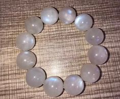 Material:moonstone beads size :Approx 16mm   quantity: one strand  6mm approx 29 pcs one strands 7mm approx25 pcs one strands 8mm approx 22 pcs one strands 9mm approx 21pcs one strands 10mm approx 19 pcs one strands 11mm approx 18pcs one strands 12mm approx 16 pcs one strands 13mm approx 16 pcs one strands 14mm approx 15 pcs one strands 15mm approx 14pcs one strands 16mm approx 14 pcs one strands 17mm approx 13pcs one strands 18mm approx 13pcs one strands 19mm approx 12pcs one strands 20mm appro White Moonstone Beaded Bracelet With 8mm Beads, Gift Blue Moonstone Beaded Bracelets, Moonstone Crystal Bracelet With 8mm Round Beads, Adjustable Moonstone Bracelets With 8mm Beads, Adjustable Moonstone Bead Jewelry, 8mm Beads, White Moonstone, Moonstone Bracelet, Moonstone Beads, Pretty Bracelets