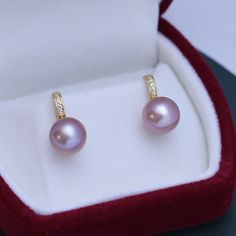 Freshwater pearls shimmer with very light overtones and classic purple body color seamlessly forming a single row of style distinction--an elegant look that only pearls can truly offer, setting them apart from any other gemstone or fine jewelry design. Materials: AAAA Freshwater Pearls, Size9-10mm, 925 sterling silver A FREE luxury jewelry box is included for high-quality pearl items. Product Information Pearl Type Freshwater Origin China Shape Round Quality AAAA Size 9-10 mm Nacre Very Thick Co Elegant Purple Pearl Earrings For Anniversary, Elegant Purple High Luster Jewelry, Elegant Purple Pearl Earrings, Elegant High Luster Purple Jewelry, Elegant Purple Pearl Earrings For Formal Occasions, Formal Purple Pearl Drop Earrings, Purple Pearl Formal Jewelry, Formal Purple Pearl Jewelry, Purple Pearl Jewelry For Formal Occasions