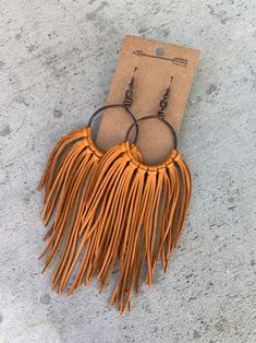 Mustard leather fringe earrings leather earrings fringe | Etsy Brown Fringe Tassel Earrings For Festivals, Bohemian Brown Fringe Earrings, Brown Dangle Tassel Earrings With Fringe, Brown Fringe Dangle Tassel Earrings, Brown Fringe Tassel Dangle Earrings, Leather Fringe Earrings, Diy En Cuir, Staple Earrings, Handmade Leather Jewelry