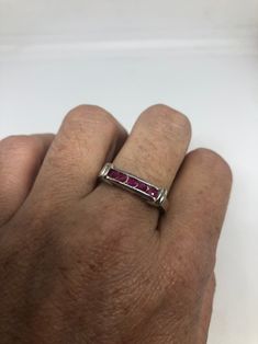 Unusual Deep Toned Ruby Sterling Filigree Setting Handmade size 9 Can be resized. My jeweler charges $10-$20 My jeweler charges a $10-$20 fee All rings are shipped free in the US in a nice gift box. Check out our over a THOUSAND great reviews Engraving is $4 per letter and is not always perfect depending on the piece. It can take a few days if the jeweler is busy. This is payable to Paypal Judithsltd@gmail.com Anniversary Ruby Jewelry Channel Set, Ruby Channel Set Jewelry For Anniversary, Channel Set Ruby Jewelry For Anniversary, Round Ruby Jewelry Channel Set, Ruby Channel Set Jewelry Gift, Red Channel Set Round Jewelry, Ruby Channel Set Jewelry For Gift, Channel Set Ruby Jewelry For Gift, Channel Set Ruby Jewelry As A Gift