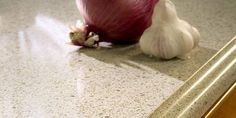 an onion sitting on top of a counter next to a mirror