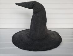 a black witches hat sitting on top of a table