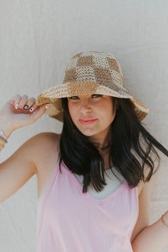 This checkered straw bucket hat is the definition of perfection. Wear this year round and make a bold statement with any outfit. Adjustable strings on the inside so you can make sure it's the perfect fit. Trendy Adjustable Hats For Picnics, Trendy Woven Straw Bucket Hat, Trendy Wide Brim Hat For Picnic, Trendy Sun Hat With Curved Brim For Picnic, Trendy Beige Straw Bucket Hat, Trendy Curved Brim Hat For Picnics, Trendy Brown Crochet Hat For Spring, Trendy Natural Brimmed Bucket Hat, Trendy Straw Bucket Hat