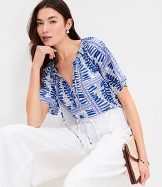 Fern Stripe Tasseled V-Neck Blouse Casual V-neck Blouse With Tassels, Flowy V-neck Rayon Peasant Top, Vacation V-neck Viscose Tops, Summer V-neck Blouse With Back Tassel Tie-up, Vacation V-neck Rayon Blouse, Vacation V-neck Viscose Blouse, Rayon V-neck Blouse For Vacation, Spring V-neck Blouse With Tassel Ties, Beach V-neck Rayon Blouse