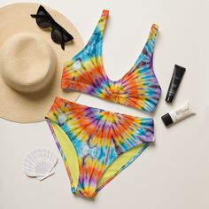 Get ready for compliments all summer long with this uniquely designed sustainable "Hippie Tie Dye" high waisted bikini set. Enjoy the smooth fabric and the flattering design, and show it off at the beach or by the pool! Removable pads and its double-layer make it comfy to wear all day by the pool or beach. It's made from soft recycled polyester with double-layering and UPF 50+. * Soft and stretchy material with UPF 50+ * Sizes up to 6XL * Bikini top comes with removable padding for comfort * Mul Surf Bikinis, Vintage Swimsuit, Summer Surf, Haute Hippie, Tie And Dye, Summer Beach Wear, Sustainable Fabrics, Stretchy Material, Upf 50