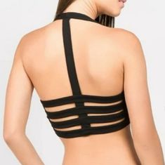 Halter Style Crop Top With Cage Back Strappy Halter Top For Club, Chic Black Halter Top With Strappy Back, Chic Black Strappy Back Halter Top, Black Spring Tops With Strappy Back, Black Strappy Halter Top For Night Out, Black Strappy Back Tops For Spring, Black Spring Halter Top With Straps, Black Halter Top With Straps For Spring, Black Strappy Halter Top For Spring