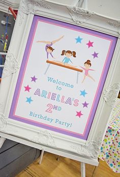 a birthday party sign with two girls doing gymnastics on the balance beam and stars in the background