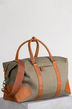 Image Khaki Canvas Bag For Travel, Large Capacity Canvas Duffle Bag, Large Capacity Canvas Duffle Shoulder Bag, Canvas Large Capacity Duffle Shoulder Bag, Khaki Canvas Satchel For Travel, Large Capacity Khaki Canvas Travel Bag, Khaki Canvas Satchel Bag For Travel, Khaki Canvas Travel Bag For Everyday Use, Everyday Use Khaki Canvas Travel Bag