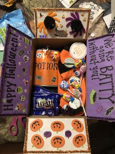 an open halloween box filled with candy and treats