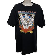 Brand New With Tags Voodoo Rock World Tour Skull Unisex Heavy Cotton T-Shirt Vintage Style Rock Tee Graphic Tee Measurements In Photos Band Merch Tops For Concert With Skull Print, Concert Graphic Tee With Skull Print, Graphic Tee With Skull Print For Concerts, Black Band Merch T-shirt For Festival, Rock Style Graphic T-shirt For Music Festival, Rock Style Graphic Print T-shirt For Music Festival, Rock Style Crew Neck T-shirt For Music Festival, Black Rock Style T-shirt For Festival, Black Rock T-shirt With Skull Print