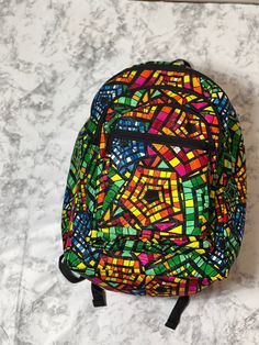 With bold colors and patterns these book bags will be the talk of the town. -Each bag has four pockets to hold all supplies needed for the day. -Adjustable straps-17 inches tall Need something a little smaller, check out our Small Ankara Book Bags. Colorful Travel Backpack, Colorful School Backpack, Multicolor Rectangular Backpack For Trip, Multicolor Everyday Bags With Adjustable Straps, Multicolor Laptop Bags For Back To School, Multicolor Backpack With Adjustable Strap For School, Everyday Multicolor Bag With Adjustable Straps, Everyday Multicolor Bags With Adjustable Straps, Multicolor Travel Backpack With Adjustable Straps