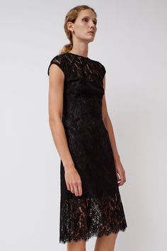 Mid length shift dress in an intricate, open work lace. Crew neckline and cap sleeve. A minimal silhouette with rich textural appeal. Black Lace Dress With Scalloped Lace For Formal Occasions, Black Scalloped Lace Dress For Formal Occasions, Black Lace Dress With Scalloped Detail For Formal Events, Formal Black Dress With Lace Work, Black Short Sleeve Lace Dress With Scalloped Lace, Black Lace Dress With Scalloped Short Sleeves, Black Lace Dress With Scalloped Details And Short Sleeves, Elegant Cap Sleeve Dress With Lace Trim, Elegant Black Lace Dress With Lace Top