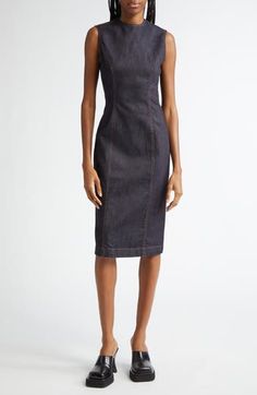 The Stockholm-based label offers a polished alternative for denim days with this sleeveless sheath dress detailed with contrast topstitching. Back zip closure Jewel neck Sleeveless 97% cotton, 3% elastane Dry clean Made in Italy Designer Clothing Elegant Fitted Denim Blue Denim Dress, Fitted Denim Dress For Work, Elegant Dark Wash Dress For Work, Elegant Dark Wash Dresses For Work, Elegant Fitted Denim Blue Dress, Sleeveless Dark Wash Workwear Dress, Dark Wash Sleeveless Dress For Work, Sleeveless Dark Wash Dress For Work, Elegant Sleeveless Denim Blue Dress