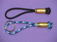 two lanyards with rope on purple background, one is gold and the other is blue