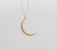 Elegant 14k solid gold crescent moon pendant. Available in 14k yellow, 18k rose or 14k white solid gold. The pendant is available with a 14k yellow or rose gold filled chain (white gold over sterling silver if you choose white gold) , a 14k solid gold chain or without chain. Size: 3cm / 1.2 inches - 2.5cm / 1 inch The pendant is available in a brushed/matte or shiny/polished finish. Perfect gift for Valentine, Mother's Day or any other special occasion. DHL EXPRESS shipping available at check ou Moon Shaped Brass Necklace For Gift, Moon-shaped Brass Necklace For Gift, Half Moon Brass Necklace For Gift, Gift Necklace With Half Moon And Moon Charm, Crescent Moon Charm Jewelry Gift, Gold Moon Necklace For Wedding, Gold Moon-shaped Wedding Necklace, Gold Moon Phase Necklace For Wedding, Half Moon Charm Necklaces For Gifts