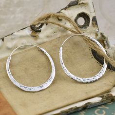 Hand Forged Hoop Earrings We ♥️ them and you will too! #silvergirl #hoopearrings Hammered Sterling Silver Teardrop Hoop Earrings, Hammered Teardrop Sterling Silver Hoop Earrings, Hammered Sterling Silver Hoop Jewelry, Hammered Sterling Silver Hoop Earrings In Silver, Silver Hammered Sterling Silver Hoop Earrings, Hand Forged Sterling Silver Hoop Earrings For Everyday, Hammered Sterling Silver Hoop Earrings, Small Hammered Silver Hoop Earrings, Silver Hammered Hoop Jewelry