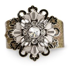 "The elements of this Art Deco Geometric Star Silver Cuff Bracelet are layered on a hammered tapering cuff bracelet. A dramatic starburst set with Swarovski rivoli and baguette stones rests on an open medallion enameled in black. The bracelet is a hammered cuff which tapers to the back and is suitable for wrist sizes 6\" - 8\". Finished in burnished silver and bronze. Signed Sweet Romance USA. The Inspiration: This design was derived from the opulent art deco interior lighting fixtures in movie Silver Adjustable Cuff Bracelet, Formal Adjustable Jeweled Cuff Bracelet, Adjustable Fusion Metal Cuff Bracelet, Adjustable Jeweled Cuff Bracelet For Formal Events, Adjustable Jeweled Cuff Bracelet For Formal Occasions, Adjustable Formal Cuff Bracelet With Jewels, Romance Fashion, Star Silver, Art Deco Geometric