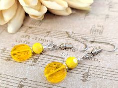 "Sunshine Yellow Crystal Earrings Beautiful sunshine yellow earrings crafted from crystals and Czech glass beads.  A wonderful gift for your bridesmaids for your upcoming wedding. * Approximate length: 2.6cm or 1\" from bottom of earring wire. * Packaged in a handcrafted gift bag. * Standard shipping by USPS First Class Mail. * All orders include delivery confirmation and insurance. * I welcome orders for all special occasions. **I respond to all inquiries within 48 hours, excluding federal holi Honey Core, Spring Wedding Jewelry, Wedding Jewelry Bridesmaids, Blue Pearl Earrings, Cottagecore Earrings, Birthday Gift For Sister, Pearl Earrings Handmade, Lavender Earrings, Aqua Earrings