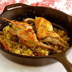 chicken and rice in a cast iron skillet