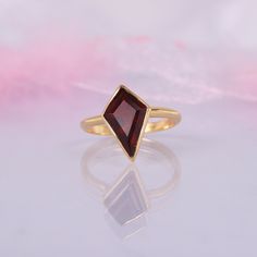 Vintage Antique Garnet Ring, 14k Solid Gold, Art Deco Kite Shaped Garnet Purpose Ring, Wedding Ring, January Birthstone, Anniversary Gift Main Stone: Garnet Main Stone creation- Lab Created Main Stone Size: 7x12mm Main Stone Color: Red Main Stone Shape: Kite Birthstone Month: January Jewelry Type: Wedding ring Metal: 14k Rose Gold \925 Sterling Silver Method: Cast Personalization: Possible Occasion: Engagement Style: Ring Size: We make rings from US 4 to US 10. (If you need smaller or bigger rin January Jewelry, Antique Garnet Ring, Garnet Ring Vintage, Month January, Fantasy Outfits, Garnet Engagement Ring, Red Garnet Ring, Engagement Ring Art Deco, Garnet And Gold