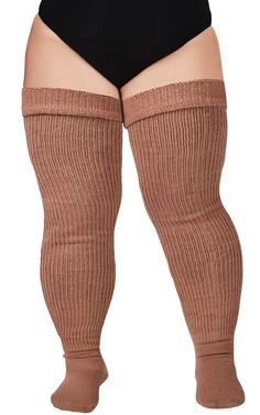 Colorful: Camel  
 Features: 60% Acrylic Yarn, 25% Stretch Yarn, 15% Polyester, keep warm, keep fashion.  
 Three Wear Ways: Thigh High Socks, Over the Knee Socks, Slouch Socks  
 Adjustable closure  
 Machine washable in cold water only  
 One Size: US 6.5 - 10  
 
 Packing List:  
 1*pair of Plus Size Thigh High Socks  
 1* pair of Garter Belts   Description   Moonwood Wear's Women's Plus Size Thigh High Socks in Camel are a stylish and comfortable accessory designed for women with larger legs. These socks offer a stretchy and comfortable fit that stays in place without slipping down. They are crafted from a high-quality blend of materials, including cotton, polyester, and spandex, which provide a soft and breathable feel that keeps feet warm without causing discomfort or irritation. Plus Size Thigh High Socks, Thigh Garters, Plus Size Thigh, Slouch Socks, Garter Belts, Leg Warmer, Stockings Legs, Plus Size Womens, Over The Knee Socks