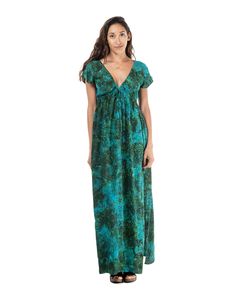 The Shoreline Long Dress is in a traditional rayon batik. It is a technique of wax-resist dyeing applied to the whole rayon cloth. This technique originated from the island of Java, Indonesia. It features a deep V neck design, cap shoulders and a tie right underneath the chest. It also has two side pockets and two small slits at the bottom hem which falls right at the ankle. This dress will elevate your look instantly. Green V-neck Batik Print Dress, Green Batik Print V-neck Dress, Green Hawaiian V-neck Dress, Casual V-neck Batik Print Maxi Dress, Resist Dyeing, V Neck Design, Wax Resist, Batik Dress, Maternity Swimwear