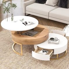 a living room with a white couch and coffee table