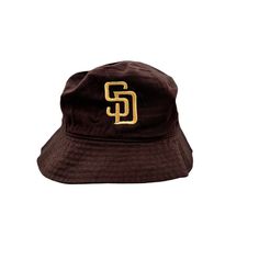 a brown hat with the letter s on it