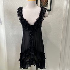 This Piece Is Black Sheer. Lots Of Ruffles And Satin Trim. Rosette On Front. Black Summer Evening Sleepwear, Elegant Black Nightgown For Summer, Black Summer Sleepwear For Evening, Black Evening Sleepwear For Summer, Black V-neck Evening Nightgown, Black Coquette Nightgown For Party, Coquette Black Nightgown For Party, Black Fitted Summer Nightgown, Fitted Black Summer Nightgown