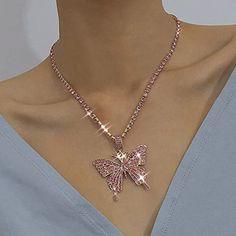 Rhinestone Pendant Necklaces Chain Sparkly Butterfly Short Necklace Is Made Of High Quality Alloy And Rhinestone , It's Strong And Durable ,Doesn't Turn Your Neck Green At All.If You Want To Have A Necklace Suitable For Matching, This Necklace Is Your Ideal Choice Shiny Butterfly Necklace Has 2 Line Extension Chain, You Can Adjust It To Your Own Size So As To Let This Concise Necklace Around Your Neck Perfectly. Package Dimensions : 4 X 3 X 0.1 Inches; 0.35 Ounces Department : Women Asin : B08ld Pink Crystal Jewelry For Valentine's Day, Pink Bling Necklace For Gift, Pink Jewel Pendant Jewelry, Rose Gold Rhinestone Necklace Gift, Rose Gold Rhinestone Necklace For Party, Rose Gold Rhinestone Necklace For Gift, Pink Rhinestone Clavicle Chain Necklace, Pink Pendant Necklace With Jewels, Pink Clavicle Chain Rhinestone Necklace