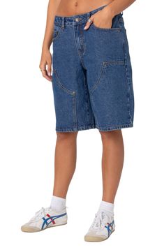 Perfectly baggy and nonchalant, these nonstretch-denim shorts exude throwback style with patch details at the front and a superlow-rise waist. Zip fly with button closure Five-pocket style 100% cotton Machine wash, dry flat Imported Denim Cargo Shorts Casual, Denim Blue Cargo Pocket Jean Shorts, Denim Blue Jean Shorts With Cargo Pockets, Denim High-waisted Shorts With Side Pockets, Denim Blue Cargo Shorts, Utility Knee-length Shorts For Streetwear, High-waisted Denim Shorts With Side Pockets, Denim Shorts With Side Pockets, Relaxed Fit Denim Cargo Shorts