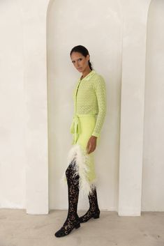 Lime Knit Skirt With Feather Details is cut from lightweight high quality knit with a hint of stretch. The skirt has ruffled feather trim and a belted waist. Style the skirt with Lime Knit Shirt and a pair of mules or heels. Composition: knit Feather details Dry cleaning Model is wearing size S We recommend sizing down Free shipping and returns on all orders Need help placing your order? email us at support@andreeva-online.com Return Policy & Shipping Ruffled Feathers, Handmade Knitwear, Feather Trim, Knitting Techniques, Knit Shirt, Handmade Knitting, Knit Skirt, Independent Designers Fashion, Badger