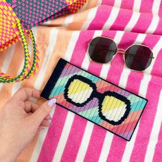 THIS LISTING IS FOR AN INSTANT DIGITAL DOWNLOAD PDF PATTERN ONLY - NO PHYSICAL ITEMS WILL BE SHIPPED TO YOU AFTER YOUR PURCHASE. ABOUT THE DESIGN: Skill level: Intermediate Finished size: 8" x 3.5"; fits standard eyeglasses and sunglasses. Stitch up THE cutest sunny accessory! This sharp glasses case is packed with colorful style that's guaranteed to make you smile every time you pull it out of our bag. Worked in continental stitch and diagonal bargello stitch, Here Comes The Sun is interesting to stitch yet quick enough to make in a weekend. A hidden flex frame keeps your sunnies securely tucked inside.  THIS DIGITAL PATTERN INCLUDES: > Complete instructions including charts and step-by-step photos  > DMC Tapestry Wool color guide and recommended supplies list > How To Bargello Beginner G Eyeglass Cases Plastic Canvas, Continental Stitch, Here Comes The Sun, Pdf Patterns, Eyeglass Case, Craft Patterns, Colorful Style, Here Comes, Glasses Case