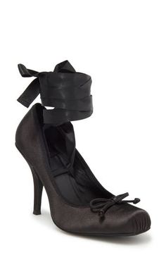 A square toe and delicate vamp bow add ballet-inspired elements to a luxe satin pump fashioned with wide ties that wrap around the ankle. 3 1/2" heel (size 8.5) Wraparound ankle strap with tie closure Textile upper/leather lining/synthetic sole Imported Ankle Tie Heels With 4-inch Heel For Night Out, Formal Ankle Tie Heels With 4-inch Heel, Fitted Heels With Satin Bow And Round Toe, Spring Heels With Satin Bow And Ankle Tie, Spring Ankle Tie Heels With Satin Bow, Fitted Satin Bow Heels With Round Toe, Satin Heels With Ankle Strap And Bow, Black Satin Ankle Strap Heels, Elegant Ankle Tie Heels With Wrapped Heel