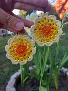 I made this beautiful yellow flower earring. Handmade Orange Flower Earrings, Handmade Yellow Flower Earrings, Handmade Orange Flower Shaped Earrings, Yellow Flower Charm Earrings For Spring, Yellow Flower Charm Earrings For Summer, Yellow Bohemian Round Earrings, Handmade Yellow Jewelry For Summer, Handmade Flower-shaped Earrings For Summer, Handmade Yellow Bohemian Earrings