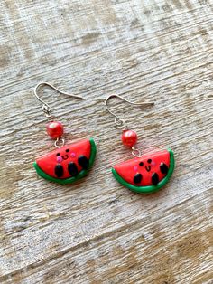 Handmade watermelon Earrings! Nickel free posts. Measures 1.75 inches long. 🍉 🍉 🍉 🍉 🍉 🍉 🍉 🍉 🍉 Jewelry Care: to keep your jewelry in optimal condition avoid dropping them on a hard surface as this can cause chips or fractures of the polymer clay. Keep your jewelry in a dry box or container when not in use. Avoid direct contact of perfumes, lotions or cosmetics while wearing your jewelry. Watermelon Colored Summer Jewelry Gift, Fun Hypoallergenic Drop Earrings, Summer Watermelon Colored Jewelry For Gift, Adjustable Kawaii Dangle Earrings, Red Fruit Design Dangle Jewelry, Fun Adjustable Dangle Jewelry, Red Dangle Jewelry With Fruit Design, Playful Summer Jewelry Gift, Playful Summer Jewelry For Gifts