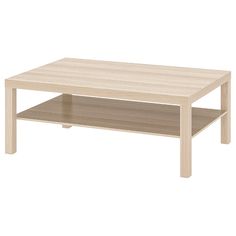 a coffee table with two shelves on the bottom and one shelf below it for storage